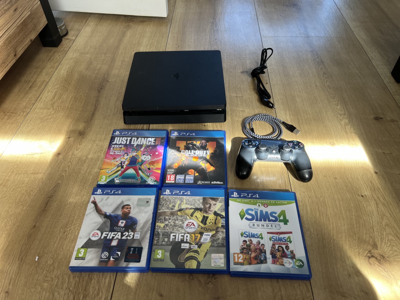 Ps4 slim 1 TB z grami i padem
